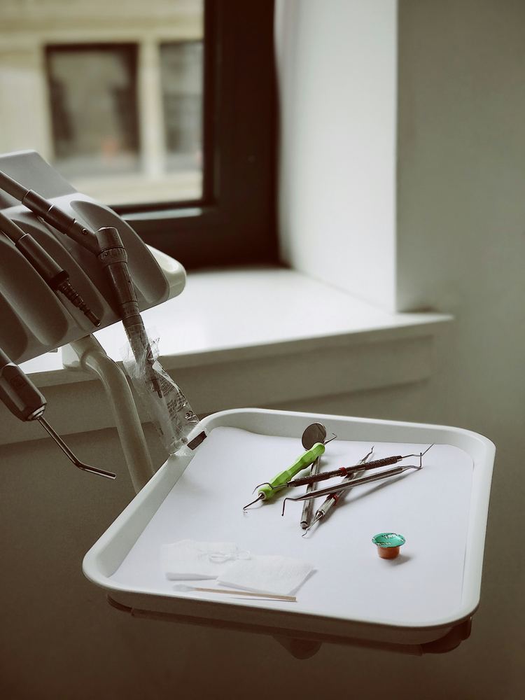 Dental instruments arranged for a routine cleaning