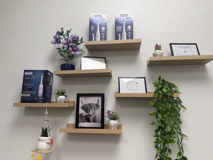 Styled shelves in the On Demand Dental office with dental care products and decor
